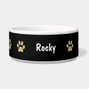 La pata imprime el cuenco grande del perro