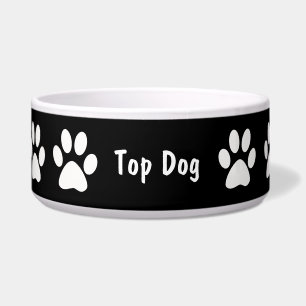 La pata imprime el cuenco grande del perro