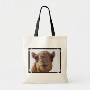 La pequeña bolsa de asas de la lona del camello