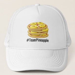 La piña pertenece en el gorra de la pizza
