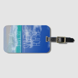 La playa soña la etiqueta del bolso con el parte