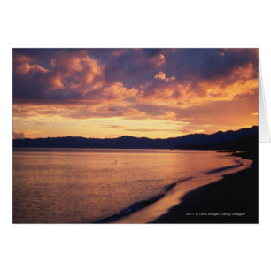 La puesta de sol en la playa