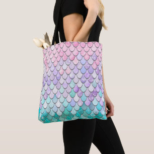 La sirena en colores pastel escala la bolsa de