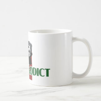 La taza blanca del adicto a las mierdas