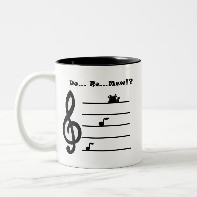 ¡La taza "… con referencia a… maúlla?! " (Izquierda)