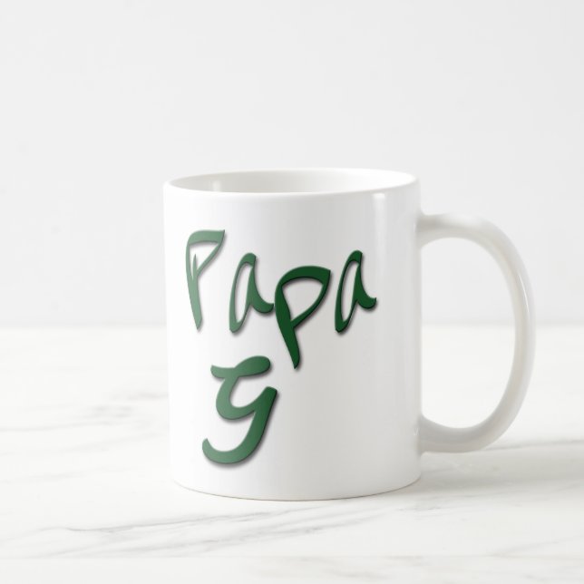 La taza de café auténtica de G de la papá (Derecha)