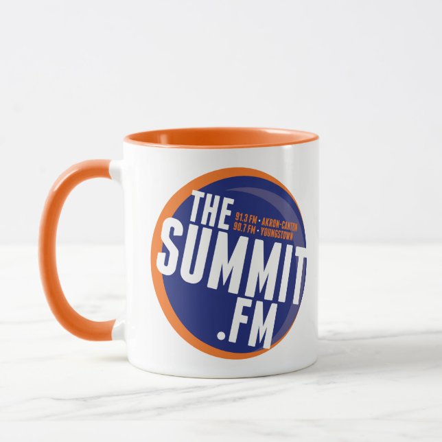 La taza de café de FM de la cumbre (Izquierda)