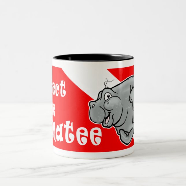 La taza de café del buceador del Manatee protege (Centro)