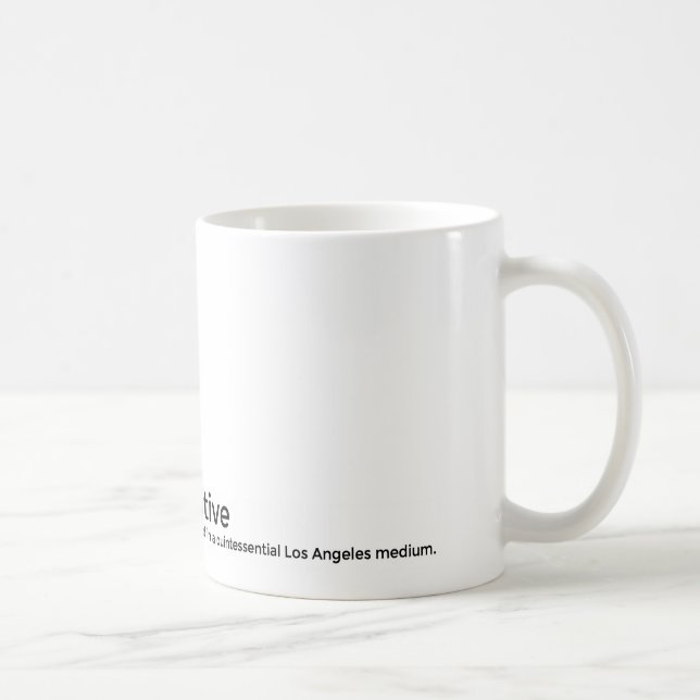 La taza de café oficial de TBC (Derecha)