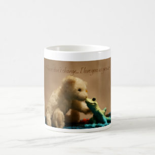 La taza de la rana del oso de peluche que se besa,