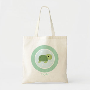 La tortuga de mar linda embroma la bolsa de asas