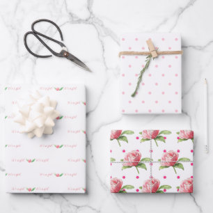 La variedad de papel de envolver rosa para las niñ