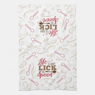 Lame la toalla de cocina de la cuchara