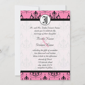 Lámpara rosa pálido con invitación a matrimonio de