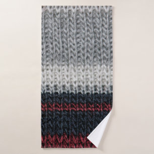 Lana de punto negra y gris con st roja y blanca
