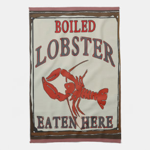 Langosta hervida y toalla