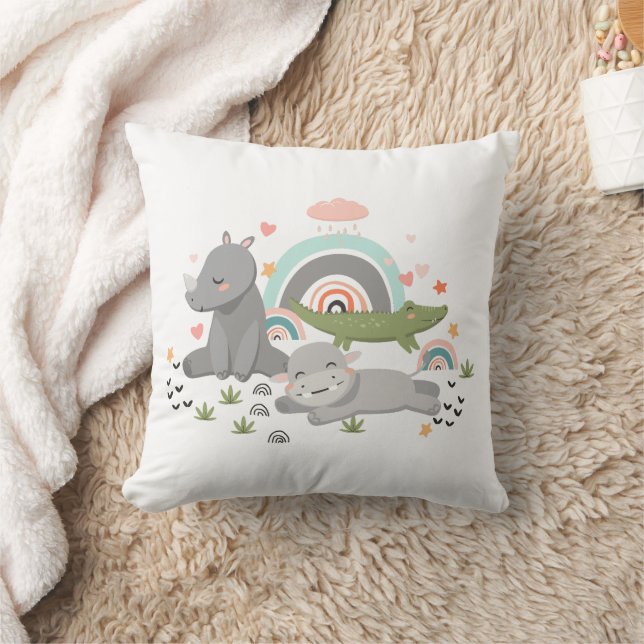 Las almohadas están decoradas con un ilustracion d (Manta)