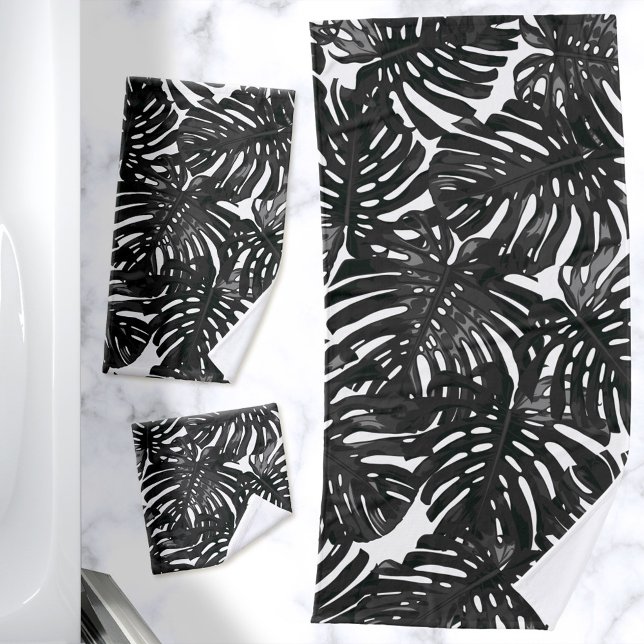 Las hojas de la selva negra tropical moderna y neg (Towel set with a print of black monstera palm leaves on a white background)