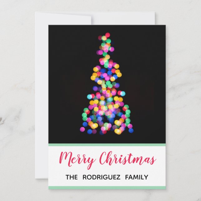 Las luces del árbol de navidad negro y moderno (Anverso)