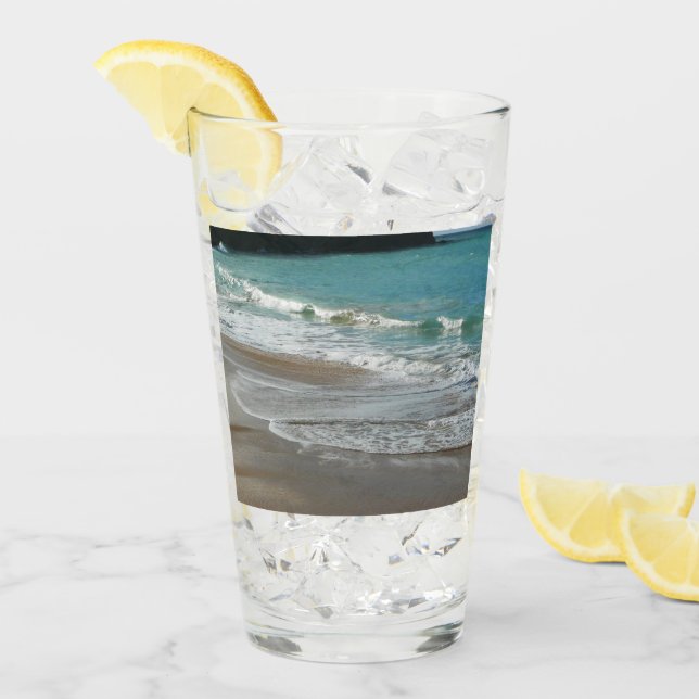 Las olas brillan sobre el océano azul turquesa de  (Anverso (hielo))