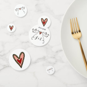 Las palomas blancas personalizadas y los confeti d