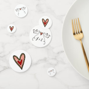 Las palomas blancas personalizadas y los confeti d