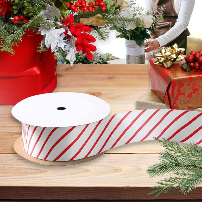 Lazo De Raso Banda diagonal de caramelo rojo y blanco con estam (A roll of ribbon for festive gift wrapping and crafts, with red and white candy cane striped pattern)