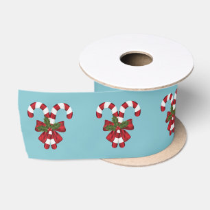Lazo De Raso Dos Caramelos De Navidad Rojos Y Blancos Sobre Azu