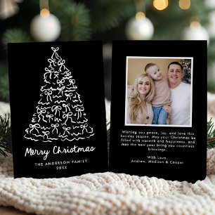 Lazos caprichosos del árbol de Navidad negro Foto