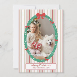 Lazos rojos de rayas y guirnaldas Feliz Navidad