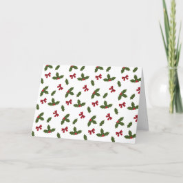 Lazos rojos y plantas de acebo de Navidad Patrón y