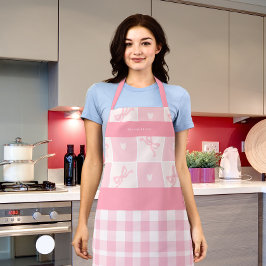 Lazos rosados lindos y delantal elegante con graci