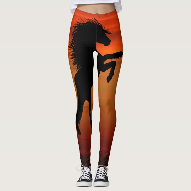 Leggings Alzar caballos negros en puesta del sol ardiente (Anverso)
