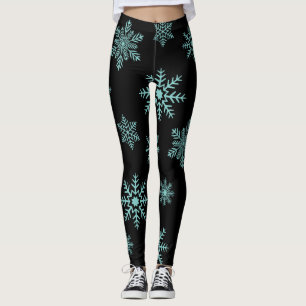 Leggings Blue Snowflakes sobre las piernas negras