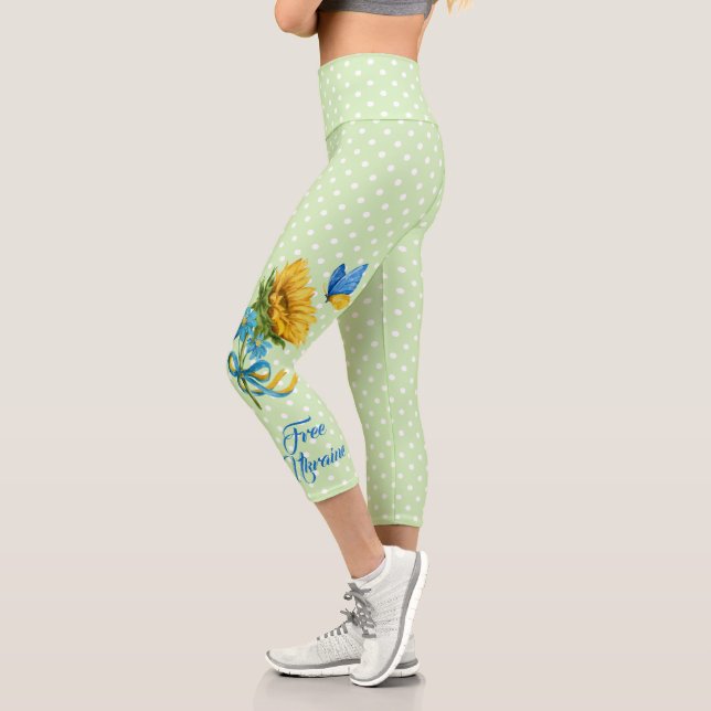 Leggings Capri Apoyo a Ucrania de girasol y mariposa (Izquierda)