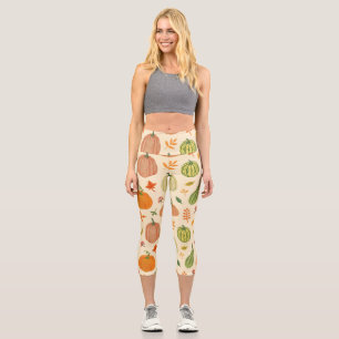Leggings Capri Calabazas verdes y naranjas, patrón sin fisuras.