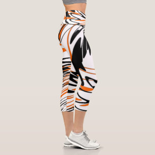 Leggings Capri Colores de Bengala Líneas Naranjas y Negras Ondula