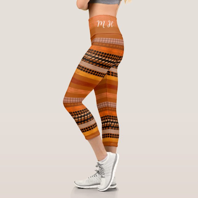 Leggings Capri Cómodas lámparas de yoga en tonos cálidos Nombre y (Izquierda)