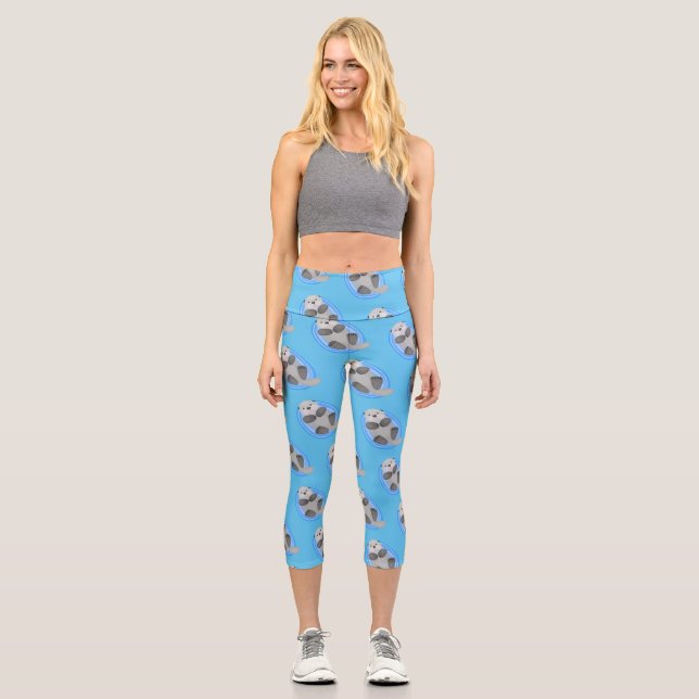 Leggings Capri Cuidada y feliz nutria azul personalizado ilustrac (Anverso)