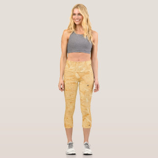 Leggings Capri El amarillo parece como el diseño de la placa de l