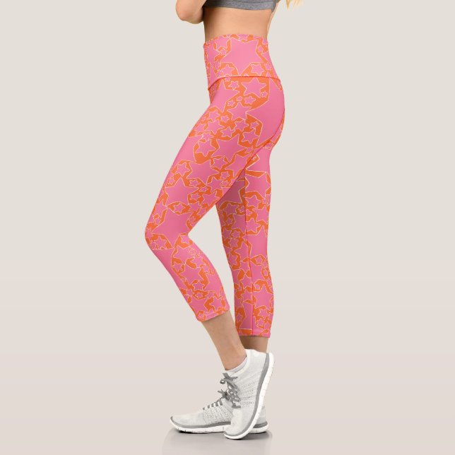 Leggings Capri Estrellas, estrellas y estrellas en rosa y Naranja (Izquierda)