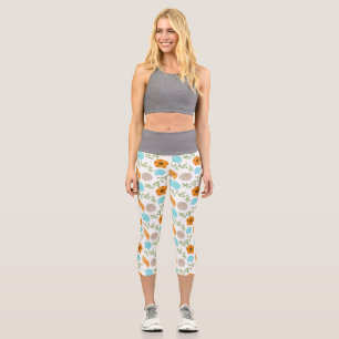 Leggings Capri Flor Naranja de caracol marino azul