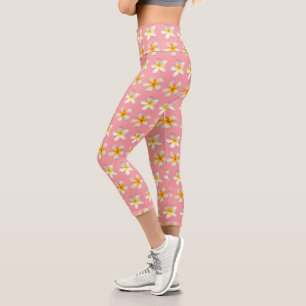 Leggings Capri Flores de Frangipani Plumeria pastel sobre rosa
