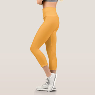 Leggings Capri fondo amarillo con borde negro
