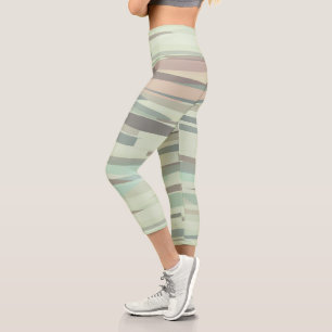 Leggings Capri franjas abstractas de color verde y melocotón