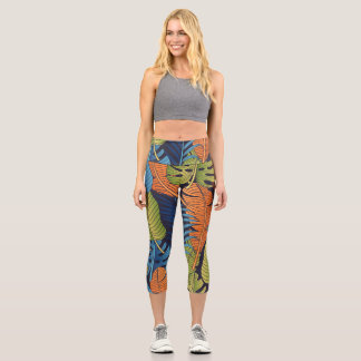 Leggings Capri Hojas tropicales, patrón floral sin costuras.