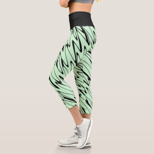Leggings Capri Involucrar la dinámica verde de la Casa de la Mone