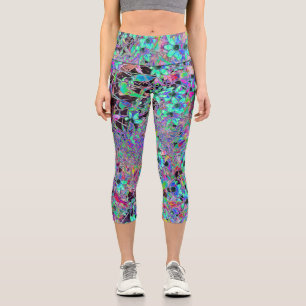 Leggings Capri Jardín púrpura con flores acuamarinas psicodélicas