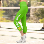Leggings Capri Jugador de pelota de Personalizado de alta demanda<br><div class="desc">Destacar en la cancha con estas insólitas leggings de capri con una bola de picnic y la palabra "PICKLEBALL" contra un fondo verde neón. ¡Cambia fácilmente el color! Las leggings cómodas y de alta calidad son perfectas para el jugador de pickleball en tu vida.</div>