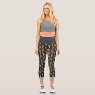 Leggings Capri Langosta de bogavante poligonal dorada sobre negro
